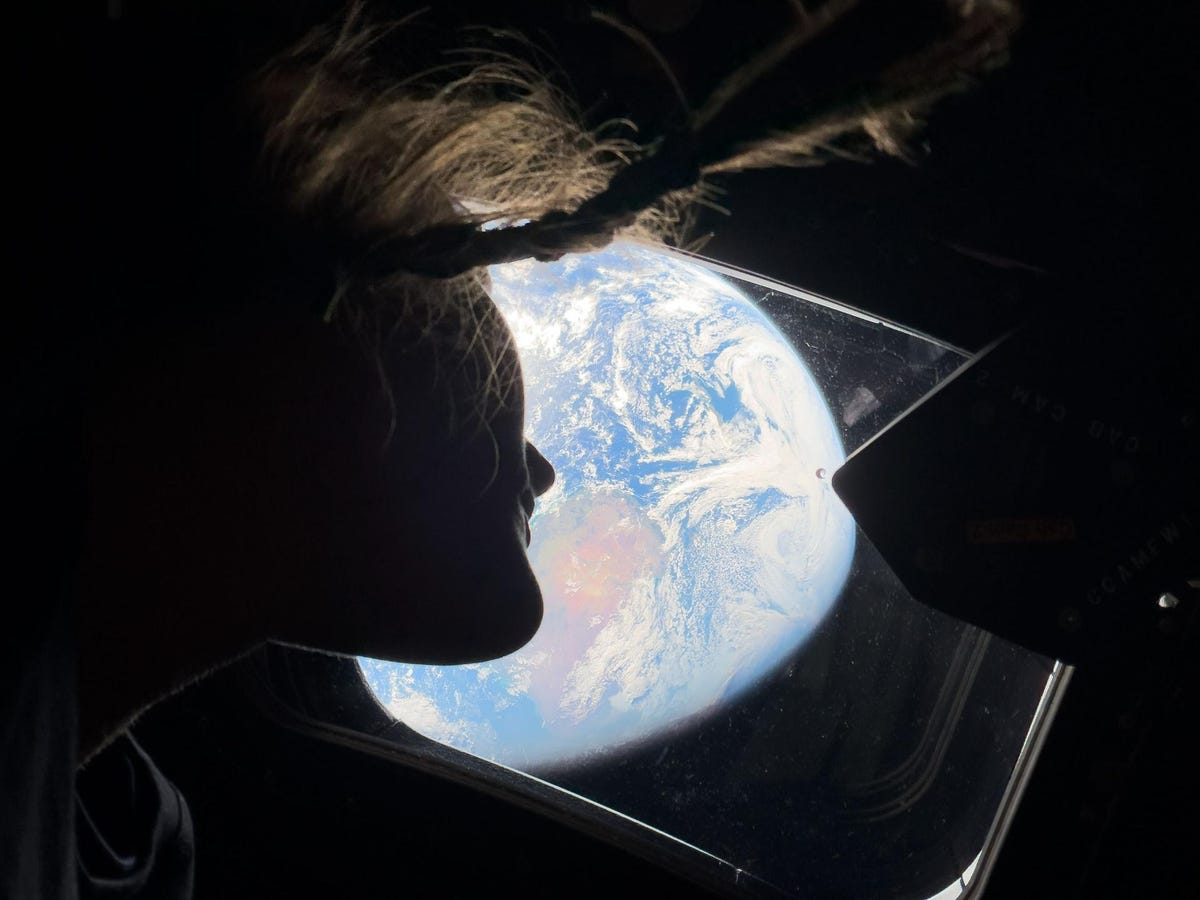 Astronaut Koch taking a selfie with an iPhone in space