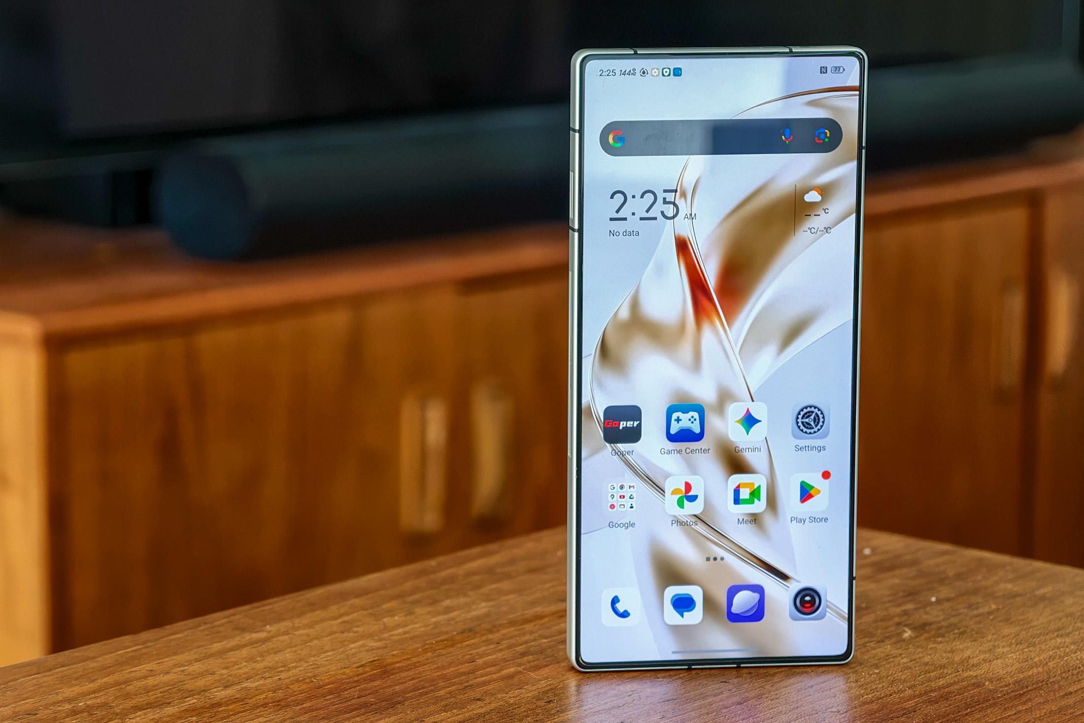 Photo of Redmagic 11S Pro in silver showing the display