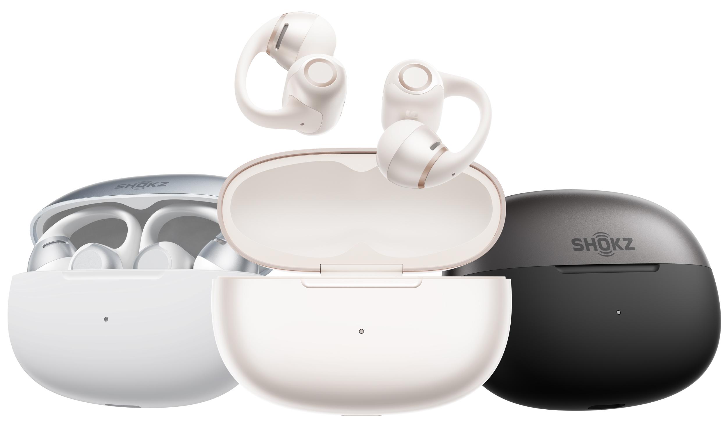 The Shokz OpenDots 2 earbuds and their charging cases in three color options.