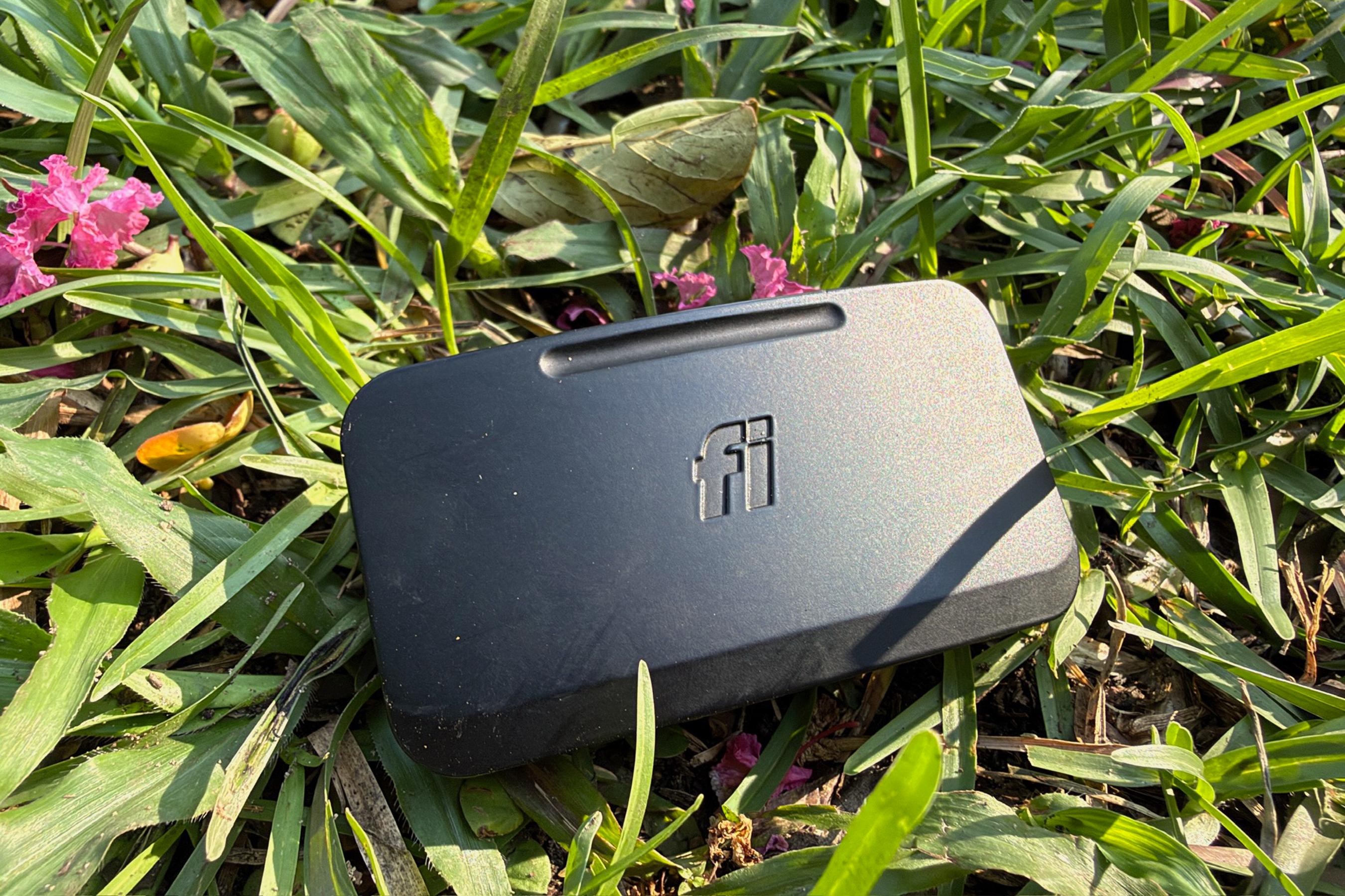 The device is 3 inches wide and about 1/2 an inch thick. It clipped securely onto my dog’s collar.